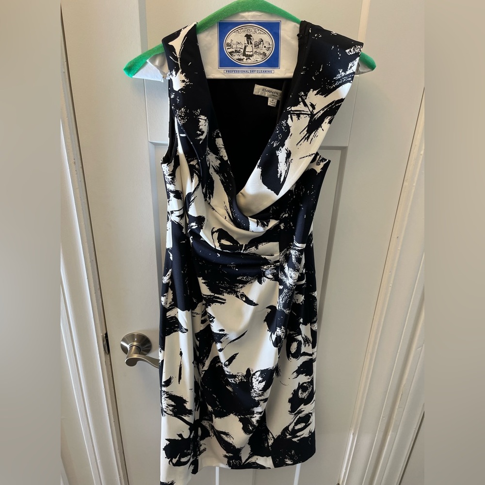 Black and white dress with collar.
